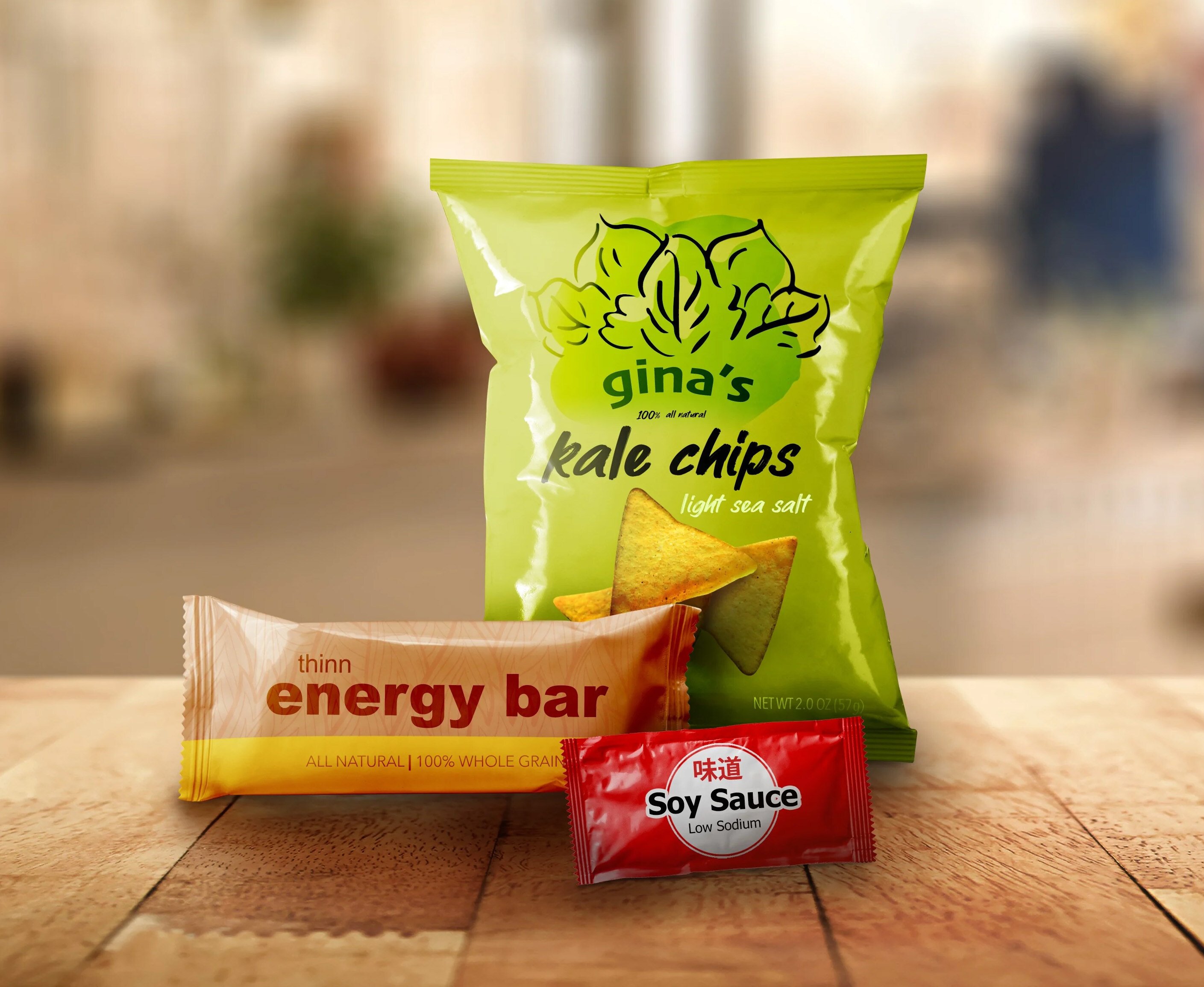 mockup of film packaging examples sitting on a wooden counter